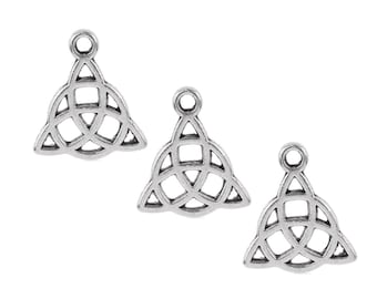 May include: Three silver-toned metal charms in the shape of a Celtic knot, also known as a Trinity knot. Each charm has a loop at the top for attaching to jewelry or other crafts.