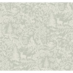 May include: A seamless pattern featuring a white silhouette of a forest scene on a light grey background. The pattern includes trees, deer, owls, squirrels, swans, and other woodland creatures.