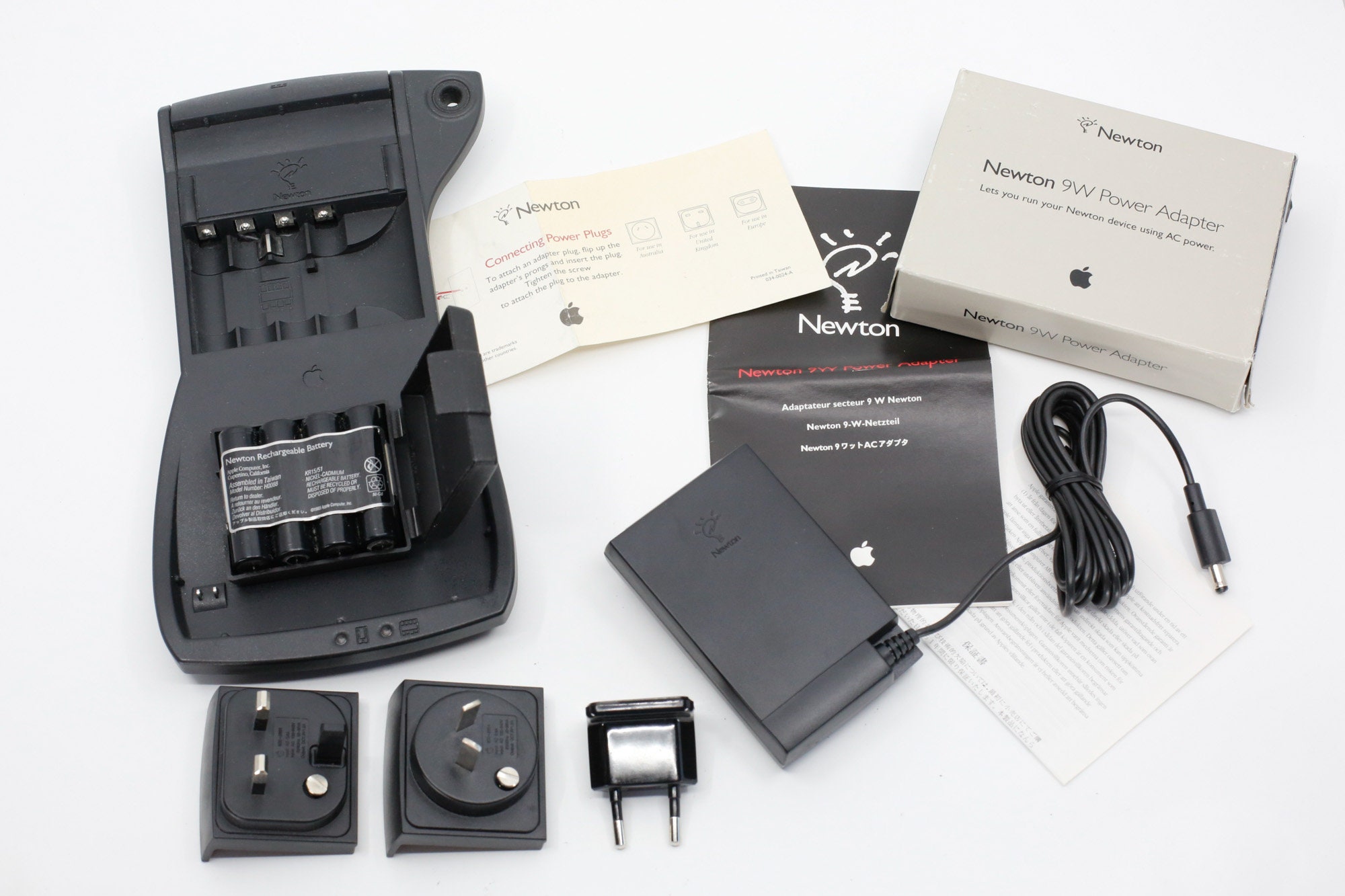 Vintage Apple Computer Newton MessagePad 110 Charging Station, Battery Pack, 9W Power Adapter and Foreign Converter Plugs