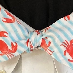 DON&#39;T BE CRABBY: Organic Cotton Sateen Bow Tie, bright red crabs on a striped pale blue/white background
