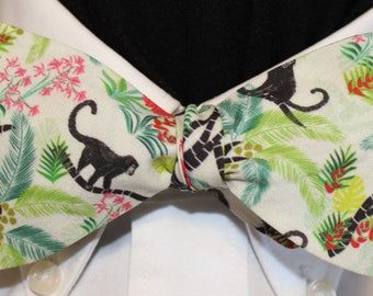 MONKEY in the MIDDLE--Handmade bow tie in novelty cotton,  brown monkeys in JUNGLE on cream colored field; bow tie, made in Portland