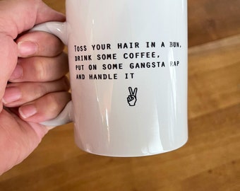 Mug - Toss Your Hair In A Bun Drink Some Coffee Put On Some Gangsta Rap And Handle It - Positive Message Quote Mug