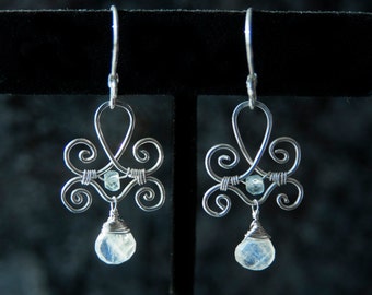 Moonstone Fleur de Lis Earrings: Sterling Silver Dangle with Ice Blue Topaz