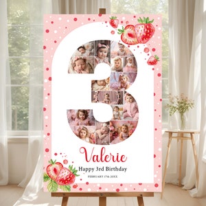 May include: Pink and white birthday sign with a large number 3 made of photos. The number is surrounded by pink polka dots and strawberries. The text "Valerie Happy 3rd Birthday February 17th 20XX" is at the bottom of the sign.