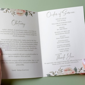 May include: A white and gray funeral program with floral accents. The program includes an obituary for Sophia V. Michaels, a welcome and introduction, a prayer, a reading of the obituary, a eulogy, a poem reading, closing remarks, and closing music. The program also includes a thank you message from the Michaels family.