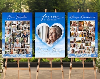 May include: Three memorial signs with a blue sky and white clouds background. The left sign says "Never Forgotten" and features a collage of photos. The center sign says "forever in our hearts" and features a heart-shaped cloud with a photo of a woman inside. The right sign says "Always Remembered" and features a collage of photos. The center sign also includes the name "Camelia Sharon" and the dates "September 20, 1945 - June 11, 2023".