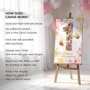 May include: A wooden easel displays a personalized first birthday sign. The sign features a large number one filled with photos, floral accents, and the name "Juliane." The sign also includes the text "Happy 1st Birthday."