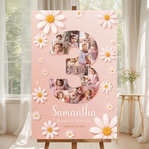 Może przedstawiać: Różowe urodzinowe tablice z dużą cyfrą 3 wykonaną ze zdjęć. Tablica jest ozdobiona białymi stokrotkami i tekstem "Samantha Happy 3rd Birthday FEBRUARY 17th 20XX".