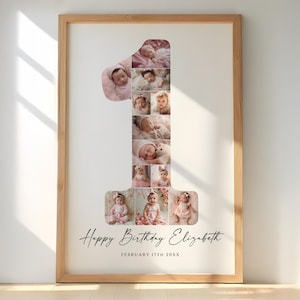 Può includere: Un collage fotografico incorniciato in una cornice di legno chiaro. Il collage ha la forma del numero uno, pieno di foto di un bambino. Le parole "Happy Birthday Elizabeth" e la data sono scritte in corsivo.