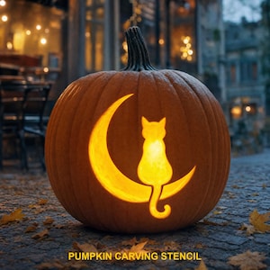 May include: A carved orange pumpkin featuring a glowing cutout design of a cat sitting on a crescent moon. The text PUMPKIN CARVING STENCIL is printed in yellow at the bottom. The pumpkin has a dark green stem and a textured, ribbed surface.