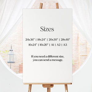 May include: A white poster board on an easel with the word "Sizes" in black text. The poster lists various sizes for prints, including 24x36 inches, 18x24 inches, 20x30 inches, 28x40 inches, 16x24 inches, 16x20 inches, A1, A2, and A3. The poster also includes the text "If you need a different size, you can send a message."