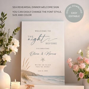 May include: A welcome sign for a rehearsal dinner with a beach theme. The sign reads "Welcome to the night before celebrating Olivia & Marcus." The sign has a watercolor illustration of a beach scene with a starfish and the text "We're so glad you're here!"