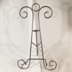 Caballete de exhibición XL, tamaño grande, diseño de pergamino, plegable, color plata oscura