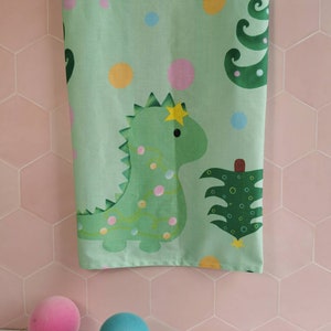 Christmas dinosaur dish towel, fun festive dinosaur kitchenware, green dish cloth, dinosaur letter box gift, dinosaur stocking filler, image 1