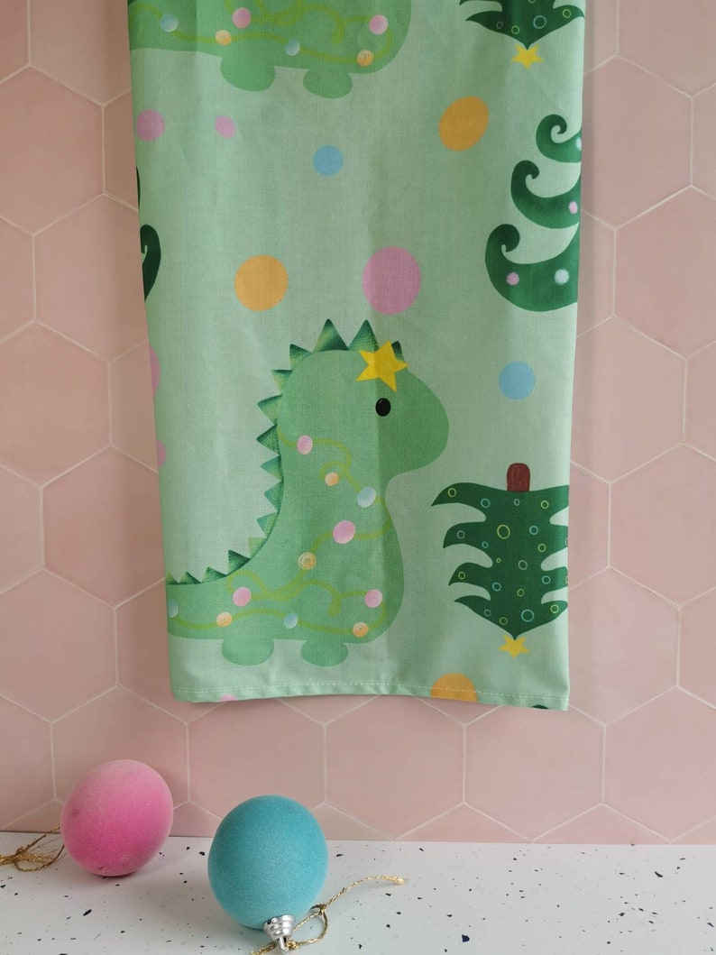 Christmas dinosaur dish towel, fun festive dinosaur kitchenware, green dish cloth, dinosaur letter box gift, dinosaur stocking filler, image 1