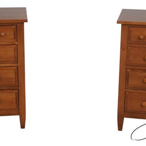 May include: Two wooden dressers with a warm brown finish. Each dresser has a rectangular top and multiple drawers with round wooden knobs. The dressers are set against a white background. The dressers are a classic style.