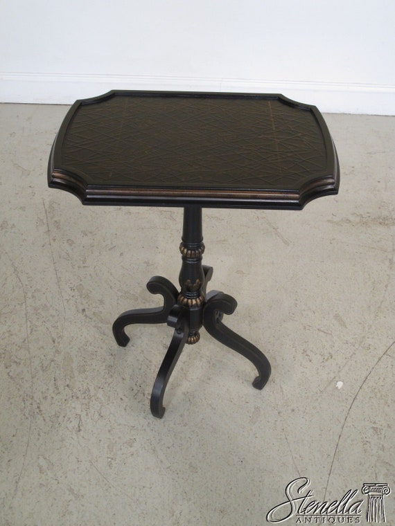 Dark Stain Pedestal Table With Black Detailing Dark Stain Pedestal Table With Black Detailing