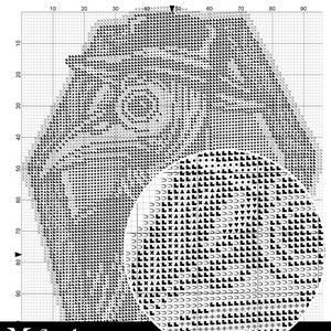 Puede incluir: Gr&aacute;fico de s&iacute;mbolos en blanco y negro para un patr&oacute;n de punto de cruz. El gr&aacute;fico muestra un dise&ntilde;o de una cara con un c&iacute;rculo en el centro. El texto "What's inside?" est&aacute; en la parte superior del gr&aacute;fico.