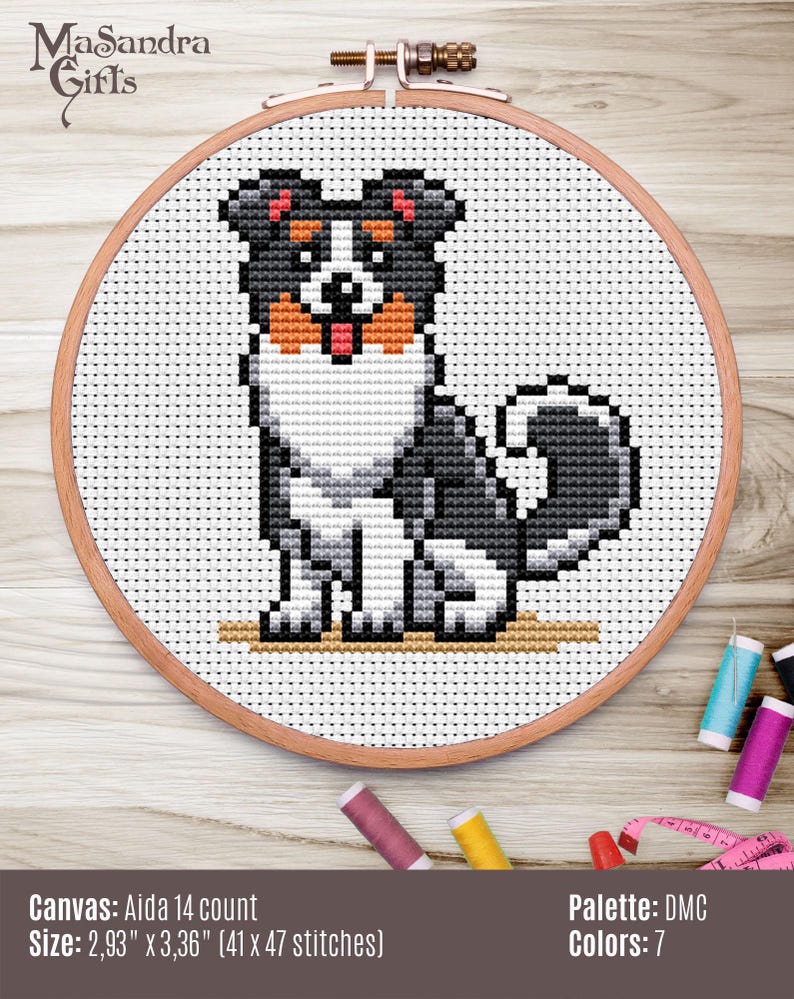 This charming cross-stitch artwork features a playful black and white dog with a cute expression, sticking out its tongue. Encircled by a wooden embroidery hoop, the design is crafted on Aida fabric using DMC thread. Measuring 2.93" x 3.36" with a stitch count of 41 x 47, it incorporates a palette of 7 colors. Surrounded by colorful spools of thread, this piece is perfect for dog lovers and embroidery enthusiasts looking to add a whimsical touch to their collection.