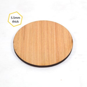 May include: A round wooden disc with a natural wood grain finish. The disc is 5.5mm thick.