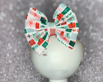 Ho Ho Ho Christmas Presents Bow on Nylon Headband/Clip, Simply Inspired By Zoe