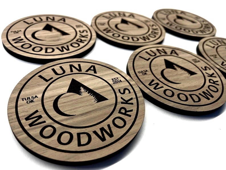 Premium engraved wood coasters made to order with your logo or message. Perfect for corporate gifts, weddings, or sustainable branded packaging.