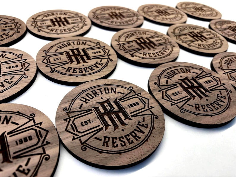 Custom engraved wood coasters with personalized business logo. Perfect for bulk gifts.
