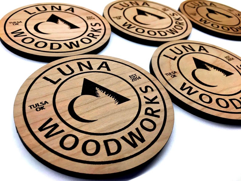 Custom engraved wood coasters with your logo or design – handcrafted in Tulsa, Oklahoma from American hardwoods. Perfect for bulk corporate gifts, wedding favors, or personalized business branding. Sustainable and gift-ready.
