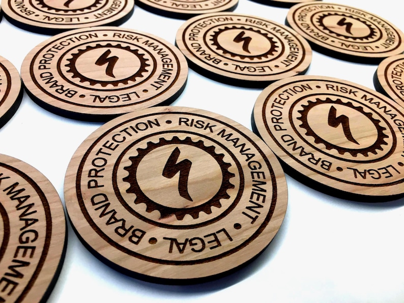 Personalized wood coasters with business logo engraved for bulk orders.