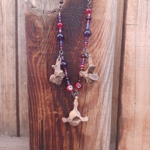 Opossum bone necklace and earrings set