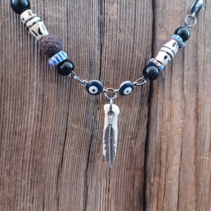 Cow tooth necklace and earring set