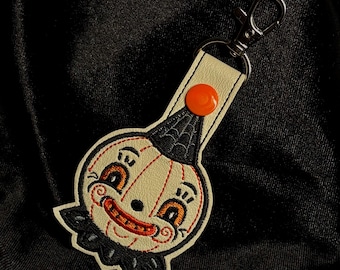 Johanna Parker Jackie White-O-Ween - Embroidered Vinyl Keychain