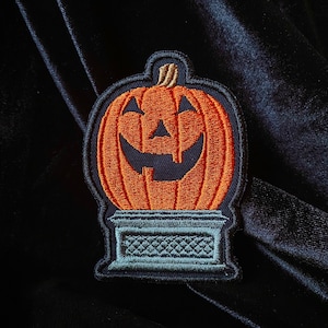 Hallow Town Center Pumpkin - Embroidered Iron-on Patch