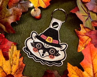 Johanna Parker Harvest Raccoon  - Embroidered Vinyl Keychain