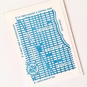 May include: A blue and white illustration of a map of Lower Manhattan, New York City. The map includes the streets W 14th Street, W 23rd Street, W 34th Street, 5th Avenue, and Broadway. The map also includes the text "To West Side & Hudson River", "To Times Square & Central Park", "Lower Manhattan", and "East River".