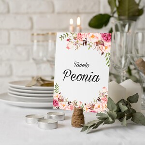May include: A rustic wooden sign with the text "Welcome to our home" in white lettering. The sign features a distressed finish and a simple, inviting design, perfect for front door decor.