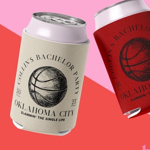 May include: Two red and beige can coolers with a basketball design and the text "Collin's Bachelor Party 2025 Oklahoma City Slammin' the Single Life" printed on them.