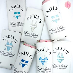 May include: A set of six white can coolers with the name "Carly's" and the text "Last Splash Lake of the Ozarks". Each cooler features a different blue swimsuit design.