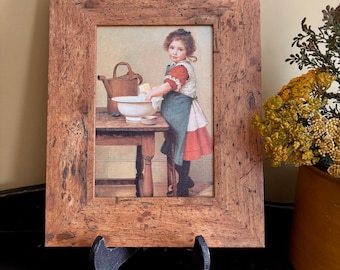 Impressão de George Dunlop Leslie "This Is The Way We Wash Our Clothes" em moldura rústica.