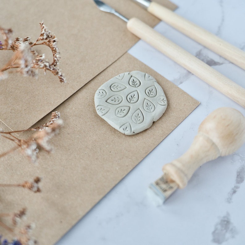 micro texture clay stamp with leaf  by biterswit