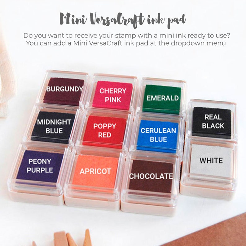 May include: A set of 12 mini ink pads in various colors, including burgundy, cherry pink, emerald, midnight blue, poppy red, cerulean blue, real black, white, peony purple, apricot, chocolate. The ink pads are labeled with their color names.  Mini VersaCraft ink pad.