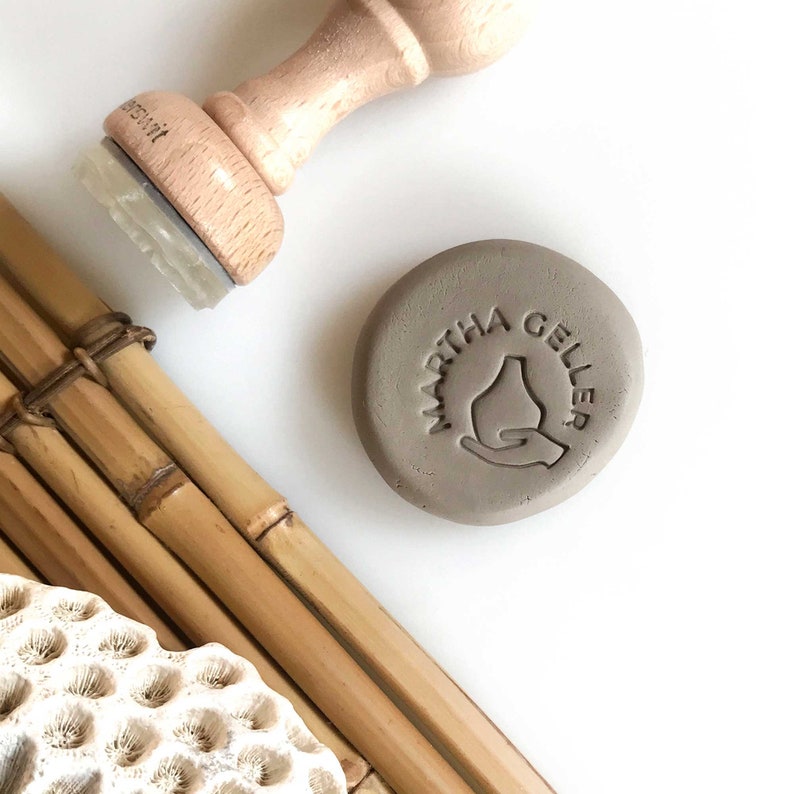 Custom clay stamp with minimal illustration and your text in a circle. Wooden handle stamp made of methacrylate. Perfect for fine printing results.