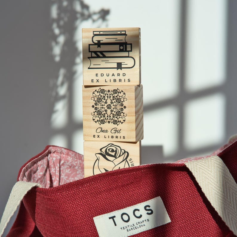 custom stamps with name and flowers and books by biterswit