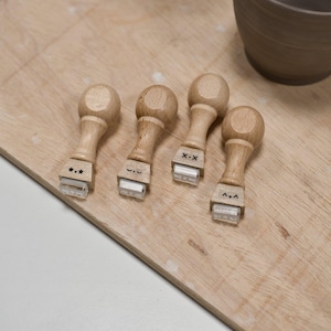 mini texture clay stamps with kawaii faces by biterswit
