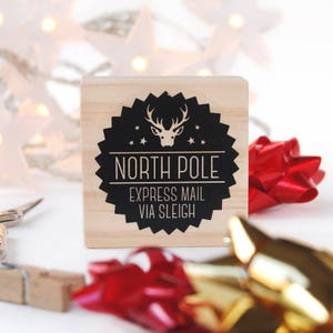 Francobollo del Polo Nord espresso tramite Sleight, francobollo per incartare Natale, francobollo ufficiale di Babbo Natale, Sleight Mail, idee per decorazioni per incartare Natale