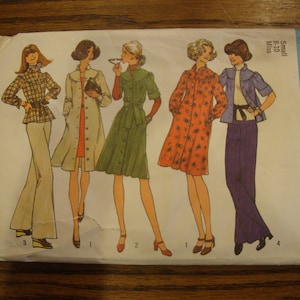 May include: A Simplicity sewing pattern for a dress and pants. The pattern is for sizes 8-10 and is $1.50. The pattern shows four different styles of dresses and pants.