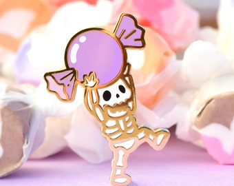 Spooky Scary Skeleton with Giant Candy Halloween Enamel Pin