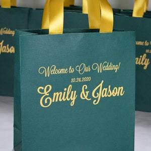 100 Wedding Welcome Bags with satin ribbon handles and names. Elegant Personalized Emerald Green & Gold wedding favors for your guests