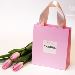Bridesmaid's gift bag with custom names. Personalized Bride Gifts and favors for Bridal shower, Hen party, Hen weekend, Bachelorette party