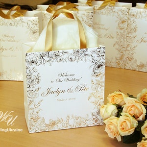 100 Gold foil stamping Personalized bags - Ivory Paper Bag with Golden satin ribbon handles - Elegant Floral Welcome Bags for wedding guests